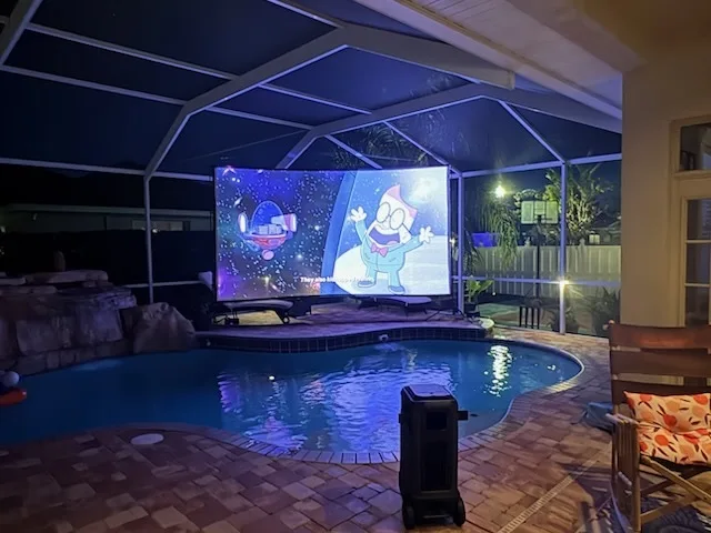 Backyard Cinema setup with projector and screen